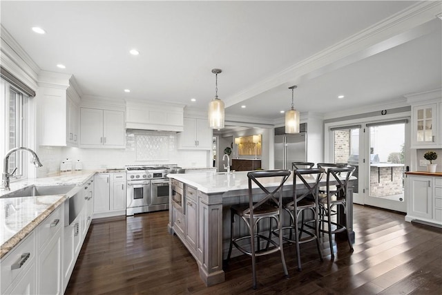 2293 Country Club Dr, Upper St Clair, PA 15241 - kitchen with built in appliances, a sink, dark wood-style floors, decorative backsplash, and recessed lighting