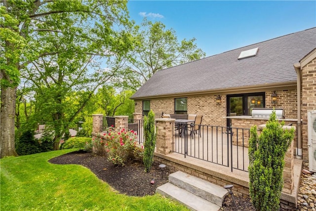 2293 Country Club Dr, Upper St Clair, PA 15241 - doorway to property featuring brick siding, a shingled roof, and outdoor dining area