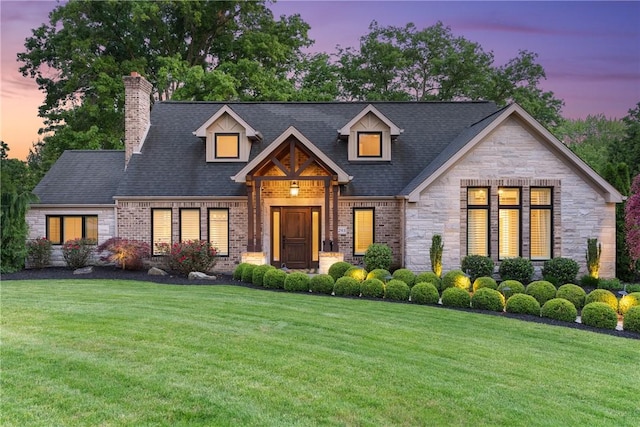 2293 Country Club Dr, Upper St Clair, PA 15241 - view of front of house featuring a yard, stone siding, a chimney, and brick siding