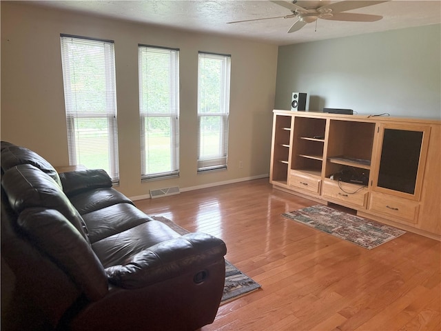 199 Lyon Ln, Lancaster Twp, PA 16037 - living area featuring a ceiling fan, light wood-type flooring, and baseboards