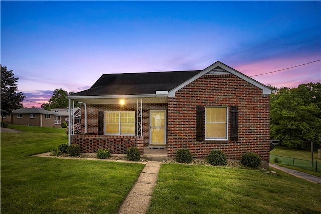 1311 Agnew Ave, Hopewell Twp Bea, PA 15001 - view of front facade featuring brick siding and a front yard