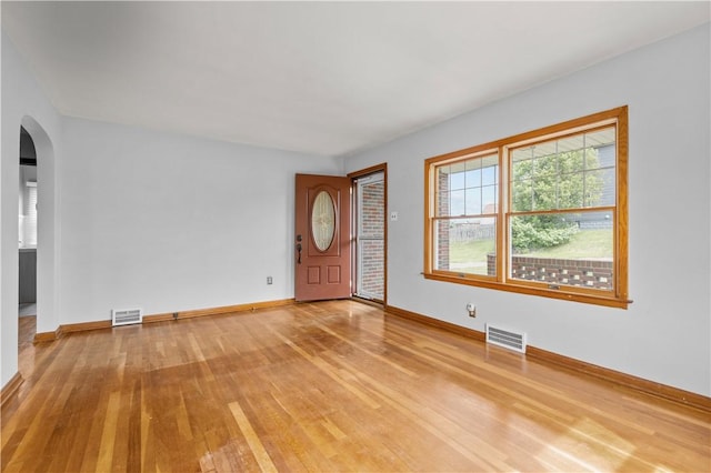 1311 Agnew Ave, Hopewell Twp Bea, PA 15001 - entrance foyer with arched walkways, hardwood / wood-style floors, and baseboards