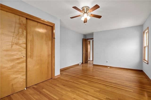 1311 Agnew Ave, Hopewell Twp Bea, PA 15001 - unfurnished bedroom with light wood-style floors, baseboards, a closet, and a ceiling fan