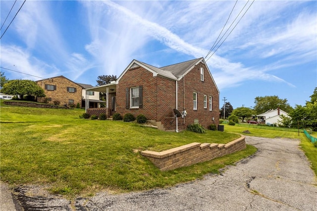 1311 Agnew Ave, Hopewell Twp Bea, PA 15001 - view of side of property featuring brick siding and a yard