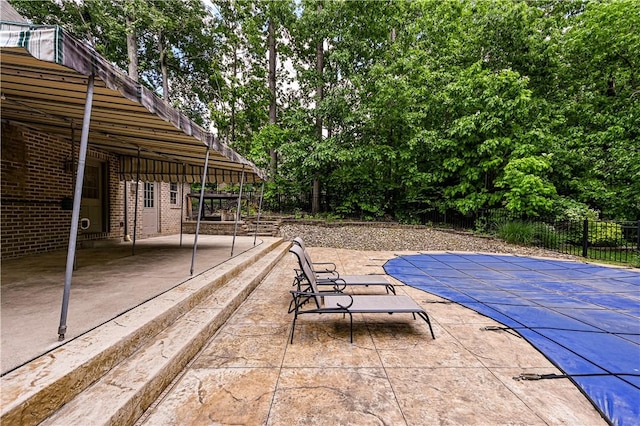 1500 Fitzgerald Ct, Unity Twp, PA 15601 - view of pool featuring a patio and view of wooded area