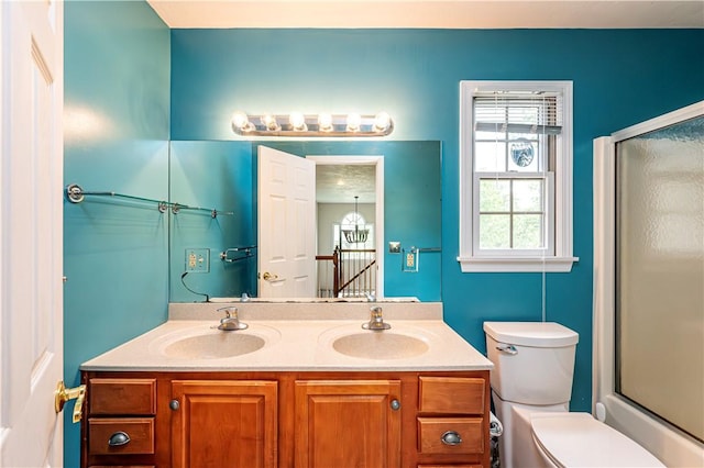 1500 Fitzgerald Ct, Unity Twp, PA 15601 - bathroom featuring double vanity and toilet