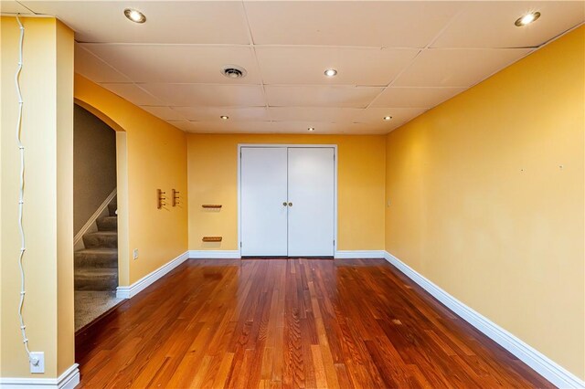 1500 Fitzgerald Ct, Unity Twp, PA 15601 - spare room featuring arched walkways, wood finished floors, baseboards, stairs, and recessed lighting