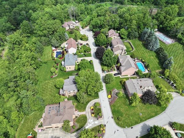 401 Chelsea Dr, Jefferson Hills, PA 15025 - aerial view of property and surrounding area with a heavily wooded area and nearby suburban area