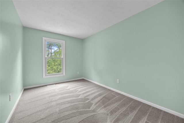 402 Hunting Creek Rd, Canonsburg, PA 15317 - spare room with carpet floors, baseboards, and a textured ceiling