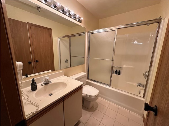 B45A Stoneridge Dr, Seven Springs Resort, PA 15557 - bathroom with tile patterned floors, vanity, toilet, and combined bath / shower with glass door