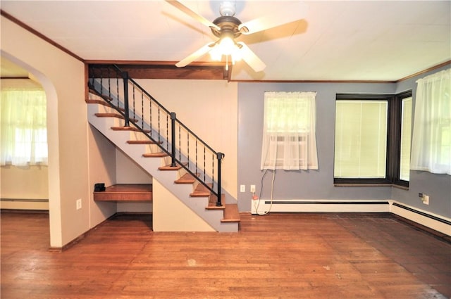 403 Bull Run Rd, Luzerne Twp, PA 15417 - interior space with baseboard heating, wood finished floors, arched walkways, stairs, and a ceiling fan
