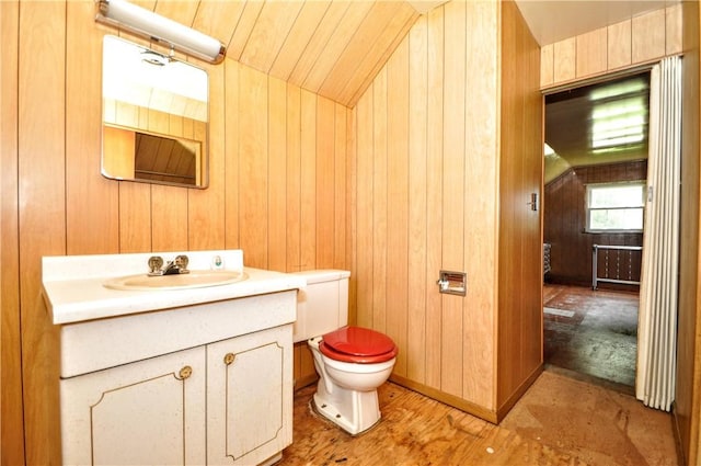 403 Bull Run Rd, Luzerne Twp, PA 15417 - half bath with vanity, toilet, wood walls, and vaulted ceiling
