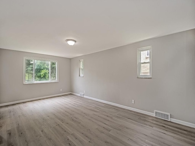129 Martinique Dr, Penn Hills, PA 15235 - empty room with wood finished floors and baseboards