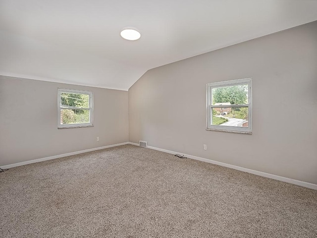 129 Martinique Dr, Penn Hills, PA 15235 - empty room with lofted ceiling, baseboards, and carpet