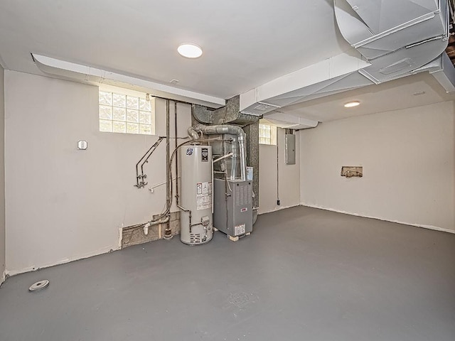 129 Martinique Dr, Penn Hills, PA 15235 - basement with water heater, electric panel, healthy amount of natural light, and heating unit
