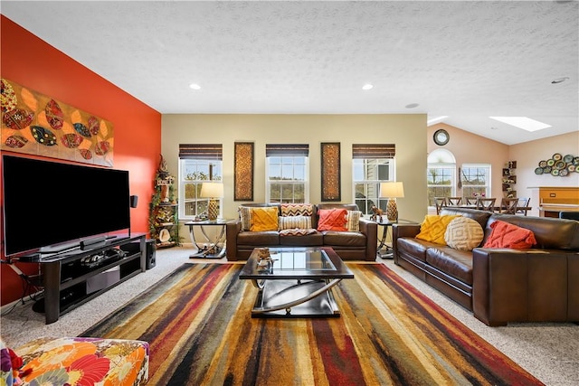 5834 Windsor Ct, South Fayette, PA 15057 - carpeted living area with a skylight, a textured ceiling, lofted ceiling, and recessed lighting