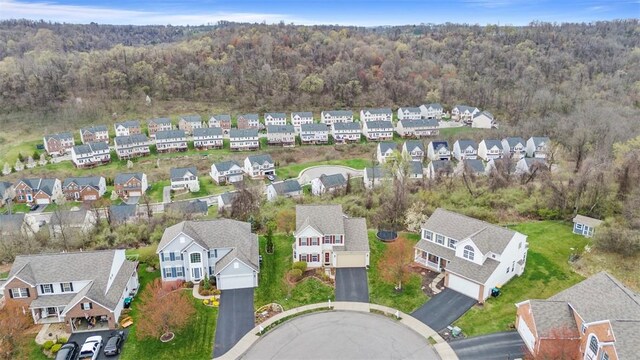 5834 Windsor Ct, South Fayette, PA 15057 - aerial overview of property's location featuring nearby suburban area and a heavily wooded area