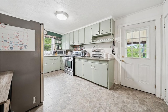 2510 7th St, New Kensington, PA 15068 - kitchen featuring appliances with stainless steel finishes, open shelves, ornamental molding, a textured ceiling, and light countertops