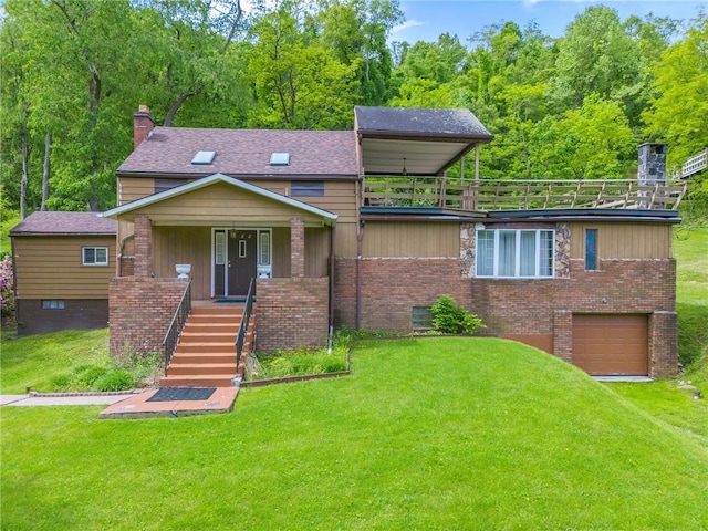 600 Pineview Dr Unit 590, Elizabeth Twp/Boro, PA 15037 - view of front of house with stairs, a chimney, an attached garage, a front yard, and brick siding