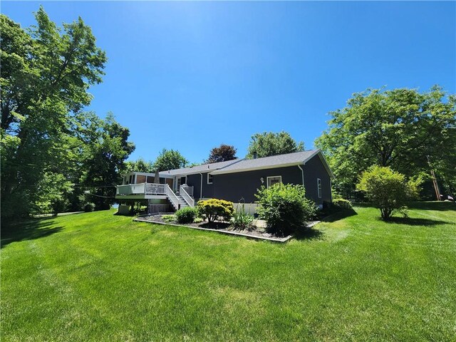 911 Aztec Trl, Coolspring Twp, PA 16137 - back of house with a yard and stairs
