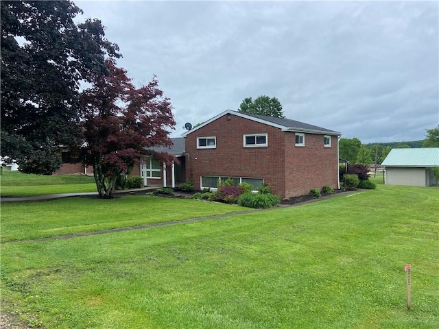 327 Craig St, Manor Twp, PA 16226 - view of front of property with brick siding and a front yard