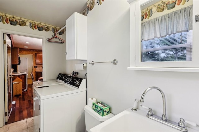 96 Concord Rd, Hermitage, PA 16148 - laundry area with independent washer and dryer, cabinet space, and light tile patterned floors