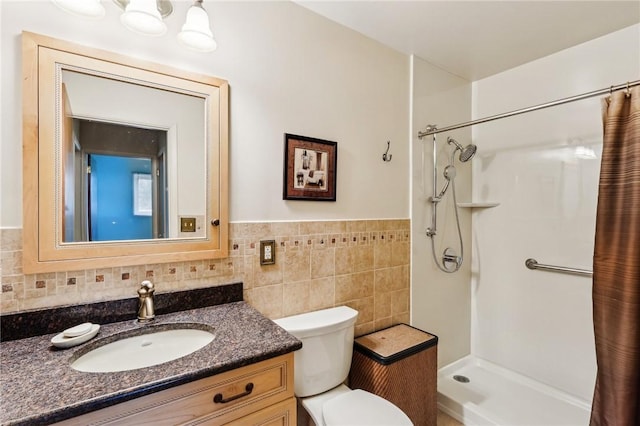 96 Concord Rd, Hermitage, PA 16148 - bathroom featuring toilet, vanity, curtained shower, tile walls, and a wainscoted wall