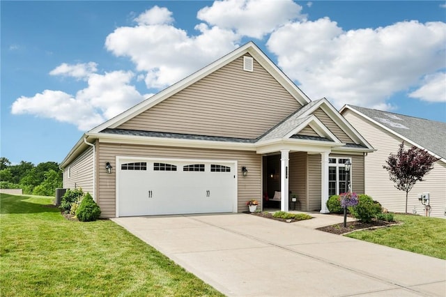219 Brookside Dr, Cranberry Twp, PA 16066 - view of front of property with an attached garage, a front yard, concrete driveway, central air condition unit, and roof with shingles