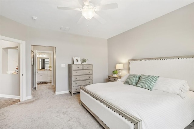 219 Brookside Dr, Cranberry Twp, PA 16066 - bedroom featuring light colored carpet, baseboards, a ceiling fan, and ensuite bathroom
