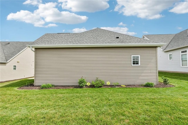 219 Brookside Dr, Cranberry Twp, PA 16066 - view of property exterior with a yard and roof with shingles