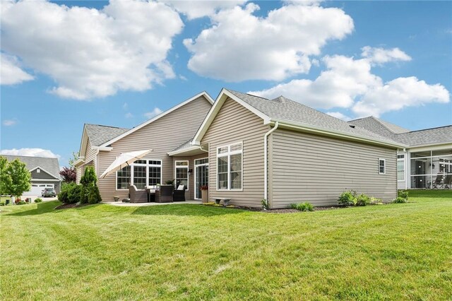 219 Brookside Dr, Cranberry Twp, PA 16066 - rear view of house featuring outdoor lounge area, a lawn, and a patio area