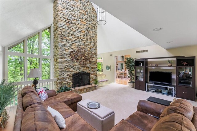 504 Timber Ln, Jefferson Hills, PA 15025 - living room with high vaulted ceiling, carpet, and a fireplace