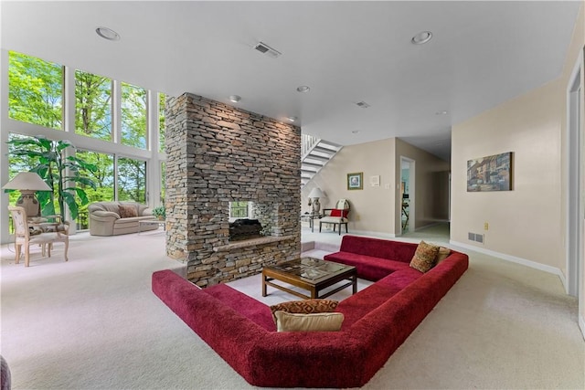 504 Timber Ln, Jefferson Hills, PA 15025 - living area with carpet floors, a stone fireplace, baseboards, and recessed lighting