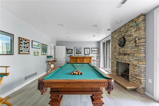 504 Timber Ln, Jefferson Hills, PA 15025 - playroom with light wood finished floors, baseboards, pool table, and a stone fireplace