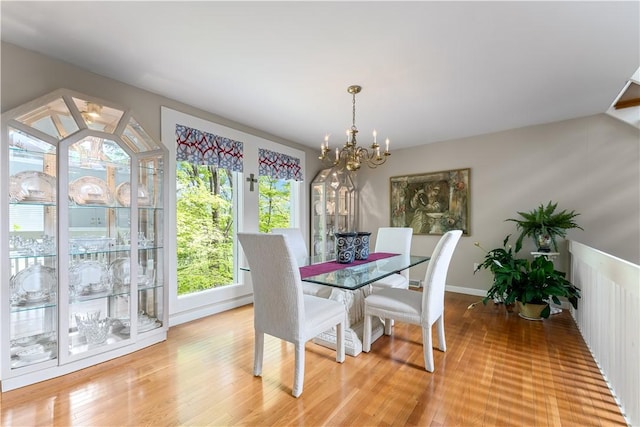 504 Timber Ln, Jefferson Hills, PA 15025 - dining room with a chandelier, light wood-style flooring, and baseboards