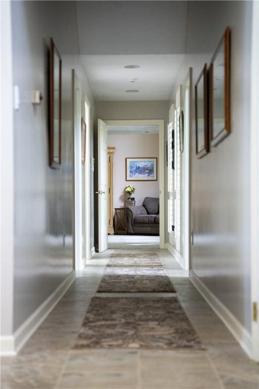 504 Timber Ln, Jefferson Hills, PA 15025 - corridor with baseboards and wood finished floors