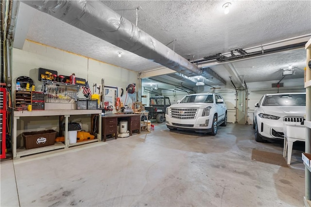 504 Timber Ln, Jefferson Hills, PA 15025 - garage featuring concrete block wall
