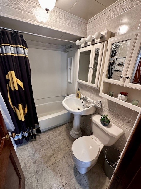 378 Ceylon Rd, Carmichaels/Cumblnd, PA 15320 - bathroom featuring toilet, shower / tub combo, and tile patterned flooring