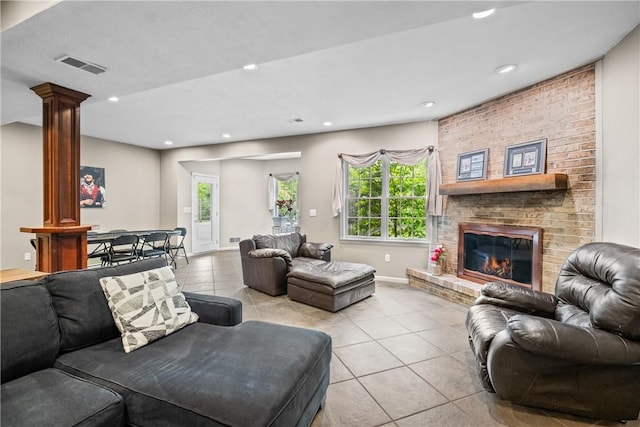 110 Marcur Ln, Center Twp Bea, PA 15061 - living area featuring light tile patterned floors, decorative columns, recessed lighting, a brick fireplace, and baseboards