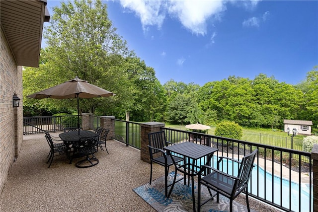 110 Marcur Ln, Center Twp Bea, PA 15061 - view of patio / terrace featuring outdoor dining area and an outbuilding