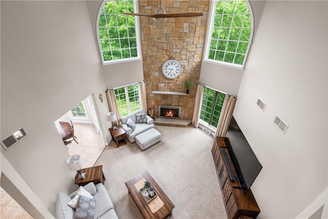110 Marcur Ln, Center Twp Bea, PA 15061 - living room with a fireplace, a high ceiling, baseboards, and ceiling fan