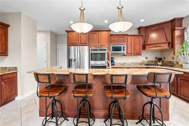 110 Marcur Ln, Center Twp Bea, PA 15061 - kitchen with appliances with stainless steel finishes, custom range hood, a kitchen island with sink, tasteful backsplash, and light stone counters