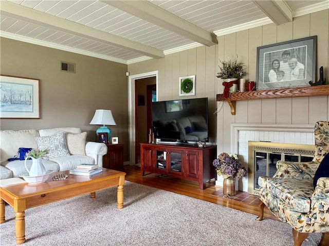411 Harrison W, Kittanning Boro, PA 16201 - living area featuring beamed ceiling, a fireplace, and wood finished floors