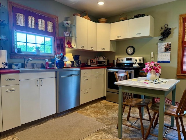 411 Harrison W, Kittanning Boro, PA 16201 - kitchen featuring appliances with stainless steel finishes, white cabinets, a sink, and recessed lighting