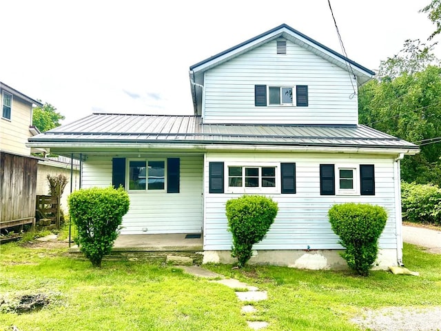 301 4th St, Luzerne Twp, PA 15413 - view of front of property with a standing seam roof, metal roof, and a front yard