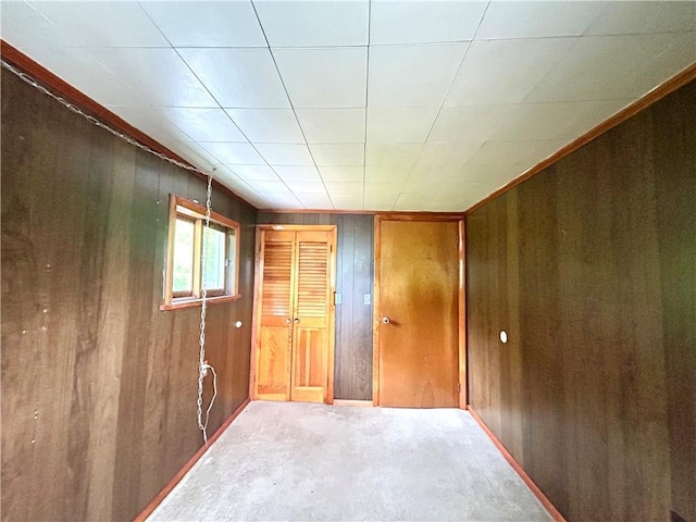 301 4th St, Luzerne Twp, PA 15413 - carpeted empty room featuring wood walls