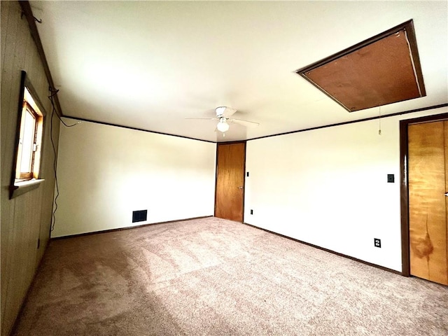 301 4th St, Luzerne Twp, PA 15413 - carpeted spare room featuring attic access, a ceiling fan, and baseboards