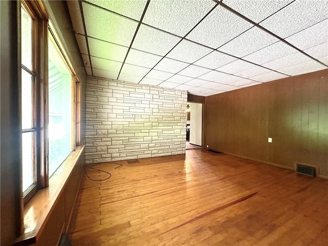 301 4th St, Luzerne Twp, PA 15413 - additional living space featuring wood finished floors and wood walls