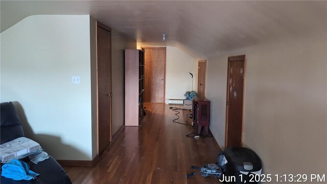 175 Sherman Ave, Waynsbrg/Frankln Twp, PA 15370 - hallway with vaulted ceiling, wood finished floors, baseboard heating, and baseboards