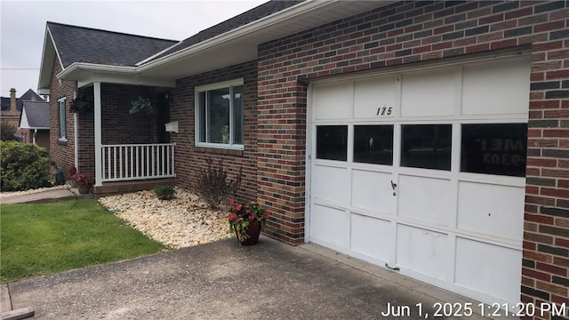 175 Sherman Ave, Waynsbrg/Frankln Twp, PA 15370 - view of home's exterior featuring brick siding, roof with shingles, and driveway